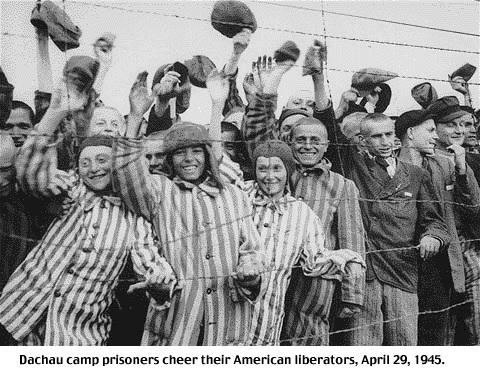 Dachau camp prisoners cheer American liberators, 4/29/1945