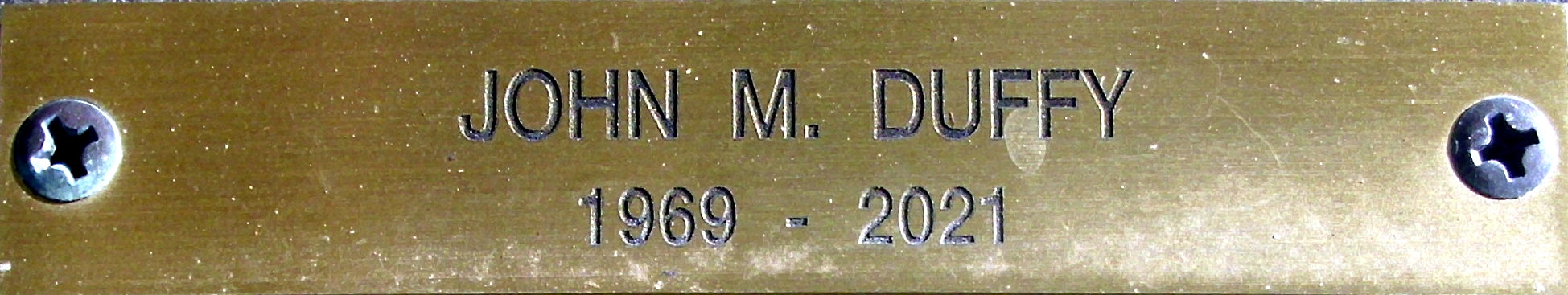 Plate JOHN M DUFFY